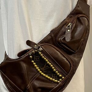 Louis Vuitton Upcycled Crossbody Bag. Authentic LV patch on brown leather.